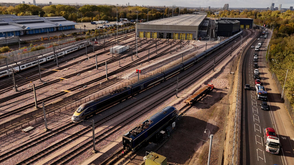 One dead and dozens injured after passenger trains collide north of London