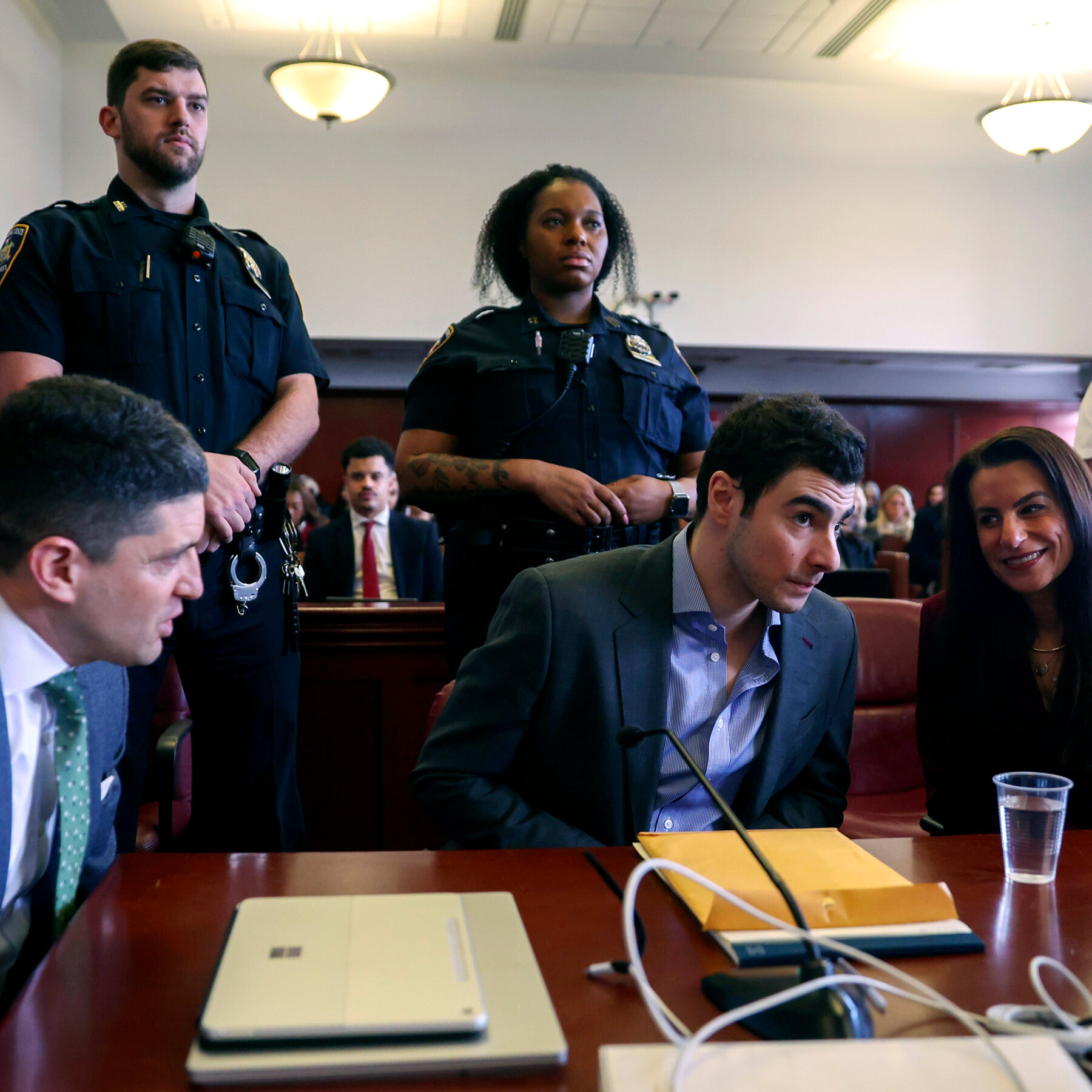 Videos Played at Mangione Hearings Reveal New Details About His Arrest