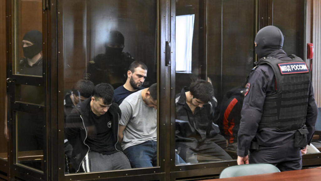 Russia sentences 15 men to life in prison for jihadist attack on concert hall