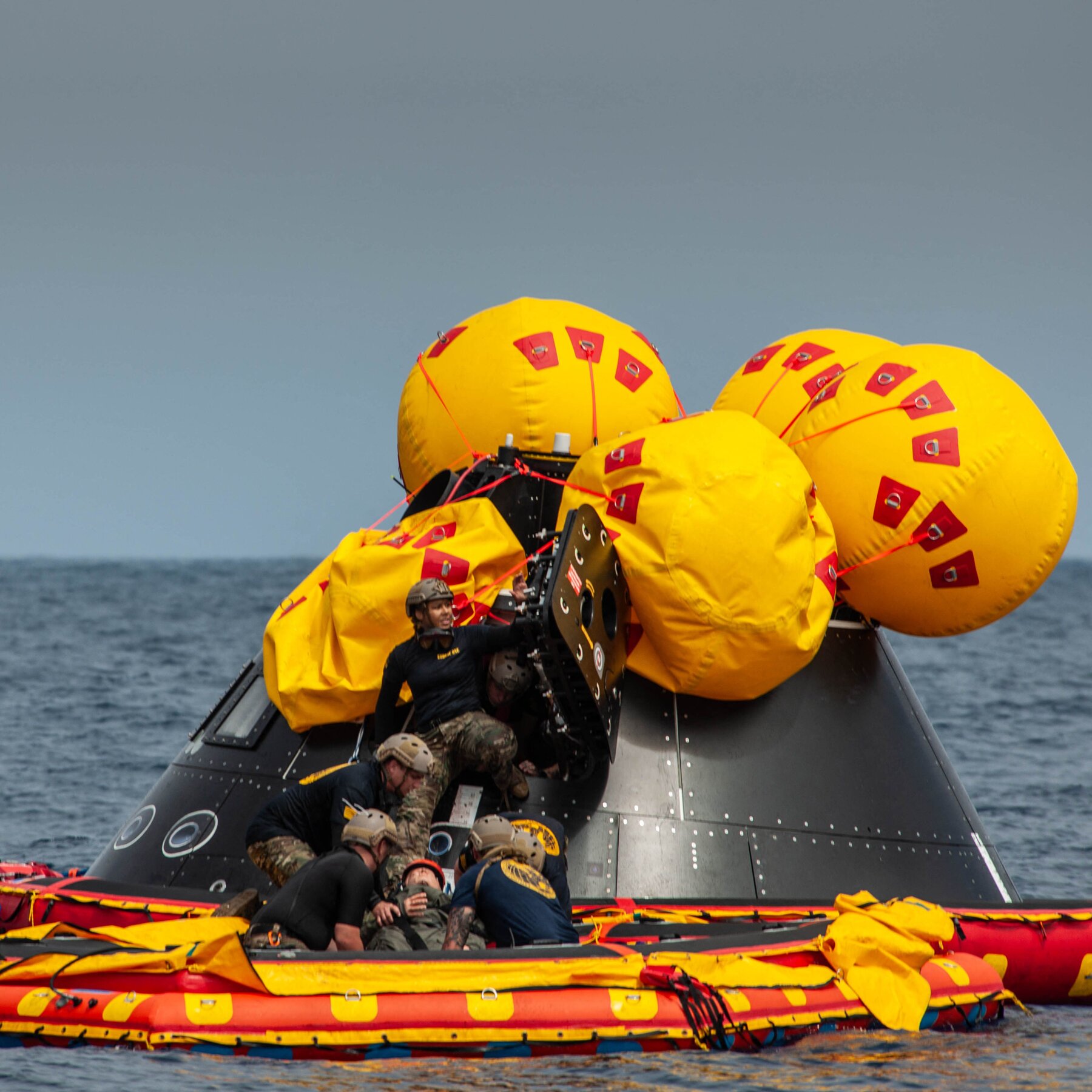 After splashdown, bring in the Navy divers.