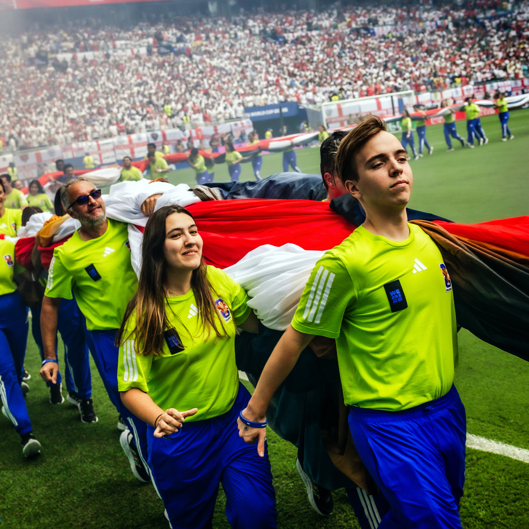 It Takes Coordination (and Many Arms) to Unfurl a World Cup Flag