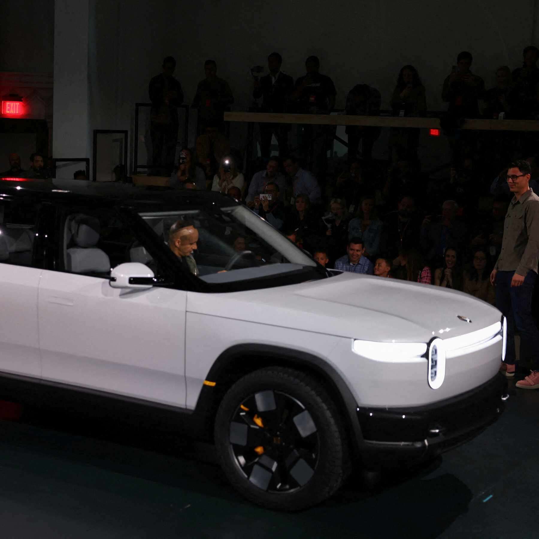 Uber to Buy Rivian Vehicles for Use as Driverless Taxis