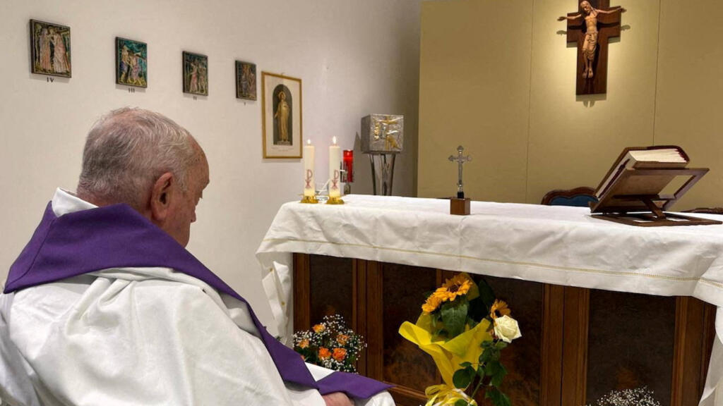 Pope seen for first time since admitted to hospital in photo released by Vatican