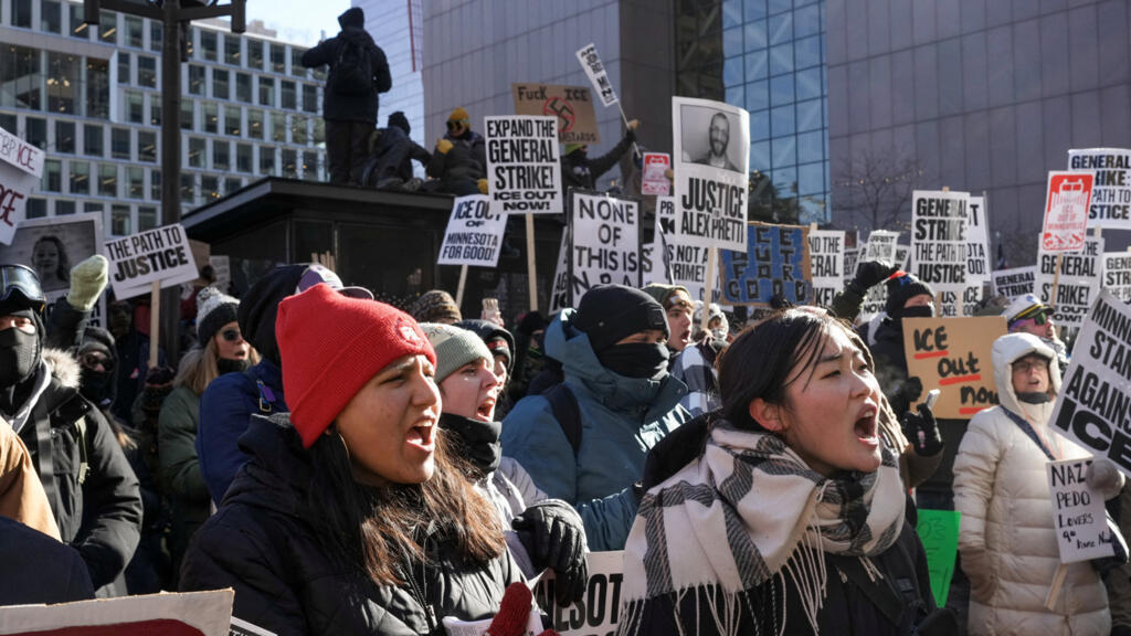 Thousands march in cities across US in 'national shutdown' against immigration crackdown