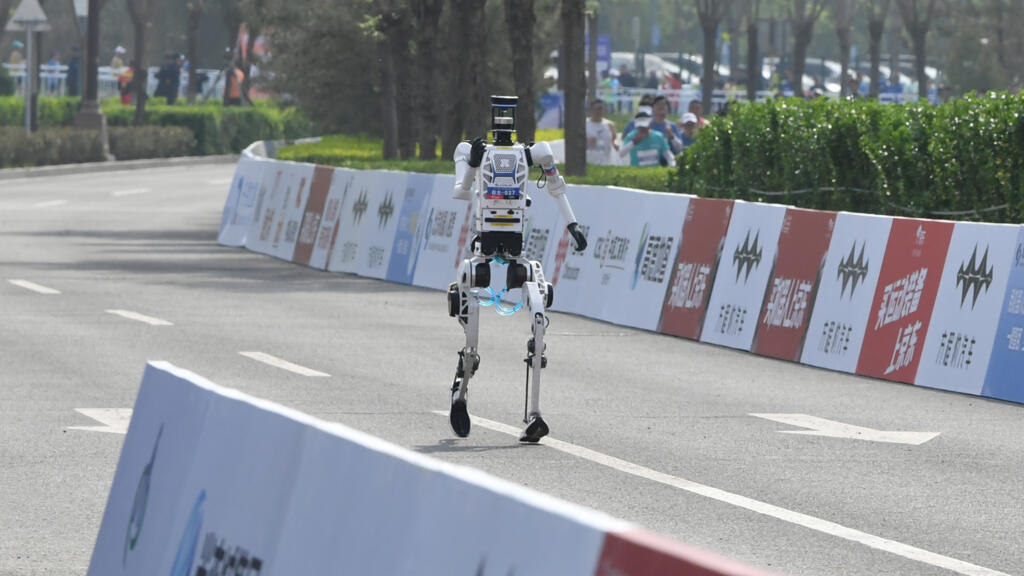 'New era': Humanoid robot outruns humans in Beijing half-marathon, beats world record