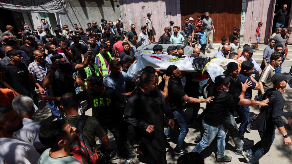 Gazans mourn aid worker killed by Israel who organised public World Cup screenings