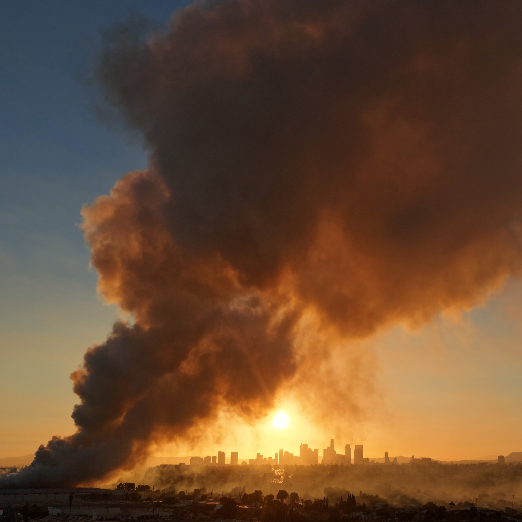 Dark Smoke in a Sunny Place: Neighbors of L.A. Fire Struggle for Breath