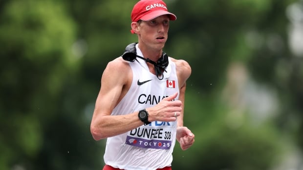 Canadian race walker Evan Dunfee wins gold at world championships