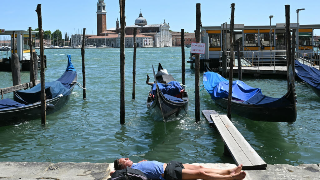 Europe swelters in summer's first heatwave as climate change intensifies