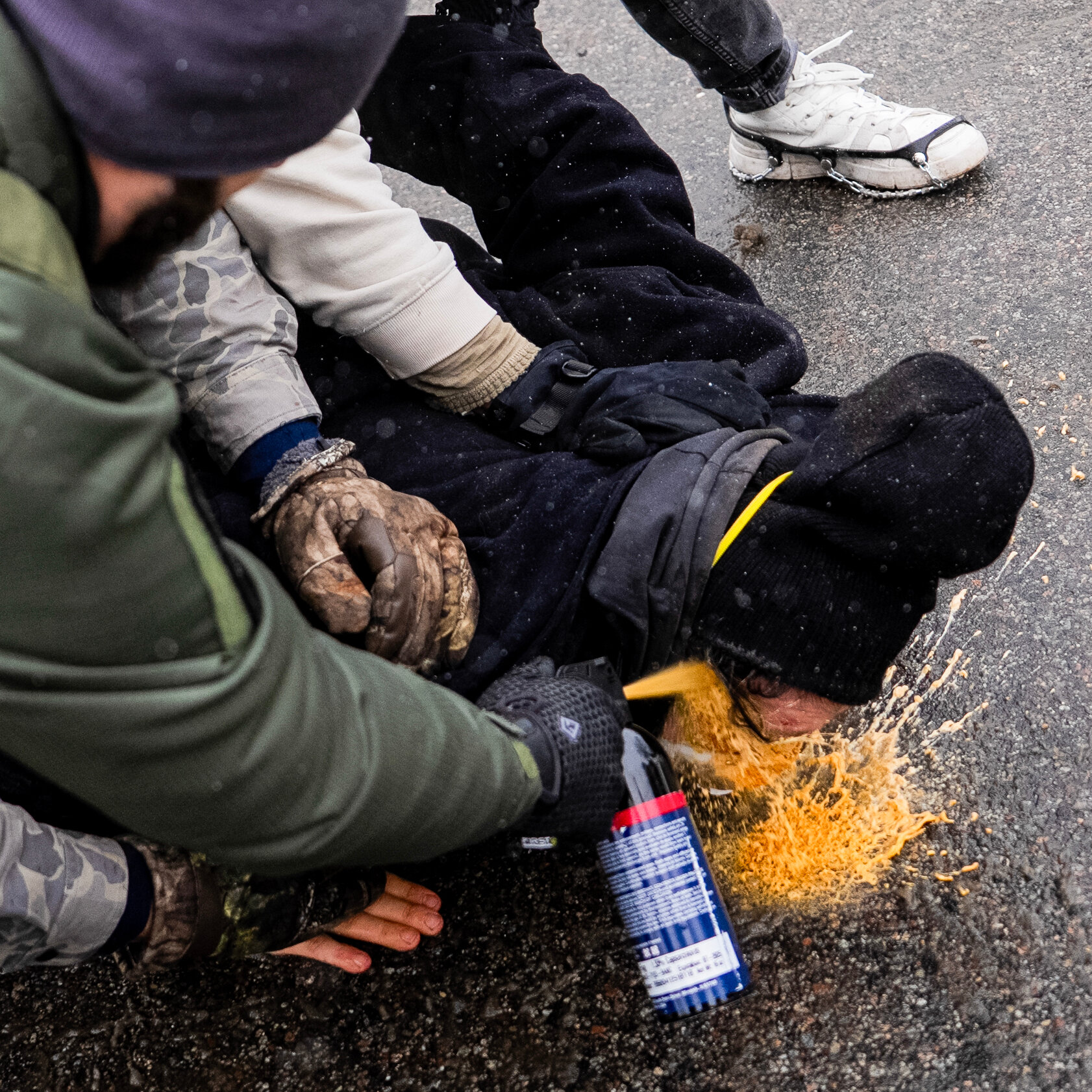 Pepper-Sprayed While Pinned Down: A Searing Scene Provokes Outrage