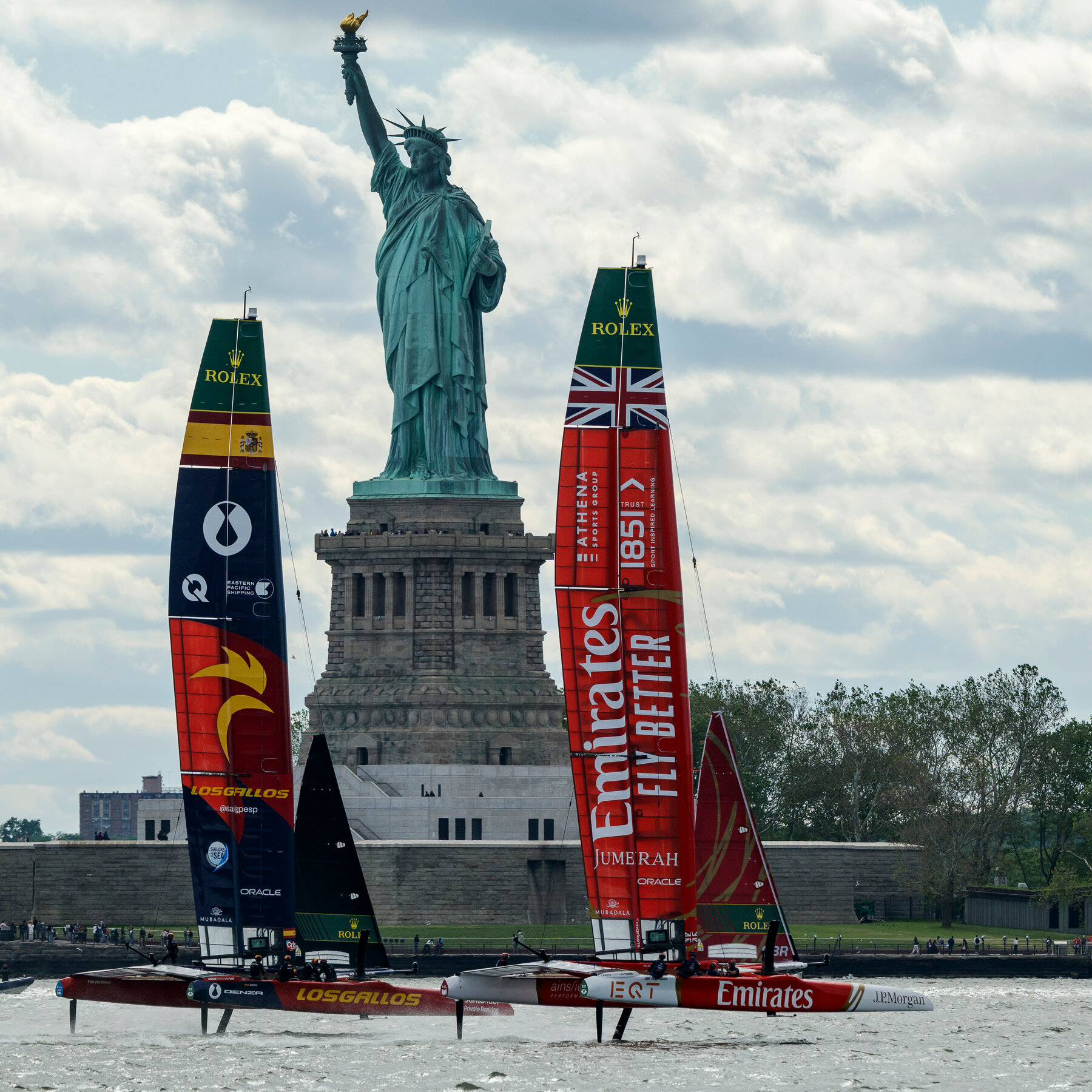 High-Speed Sailboats Race Past the New York Skyline