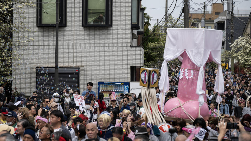 Crowds march with giant phalluses at Japan’s fertility festival