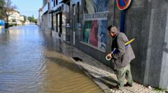 Europe feels the impact of weeks of wet weather and freezing cold