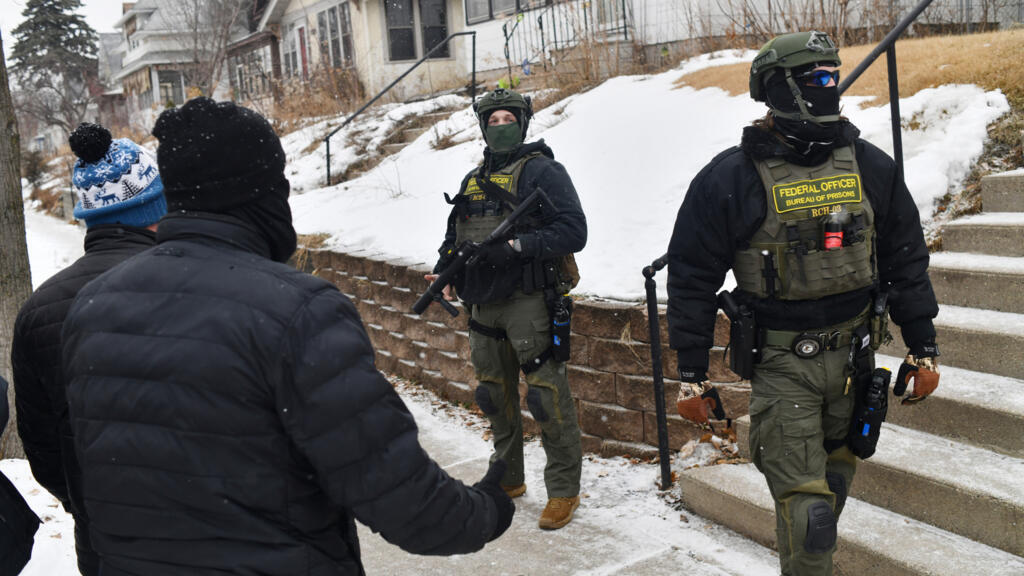 US judge bars ICE agents from arresting peaceful Minnesota protesters or pepper-spraying them