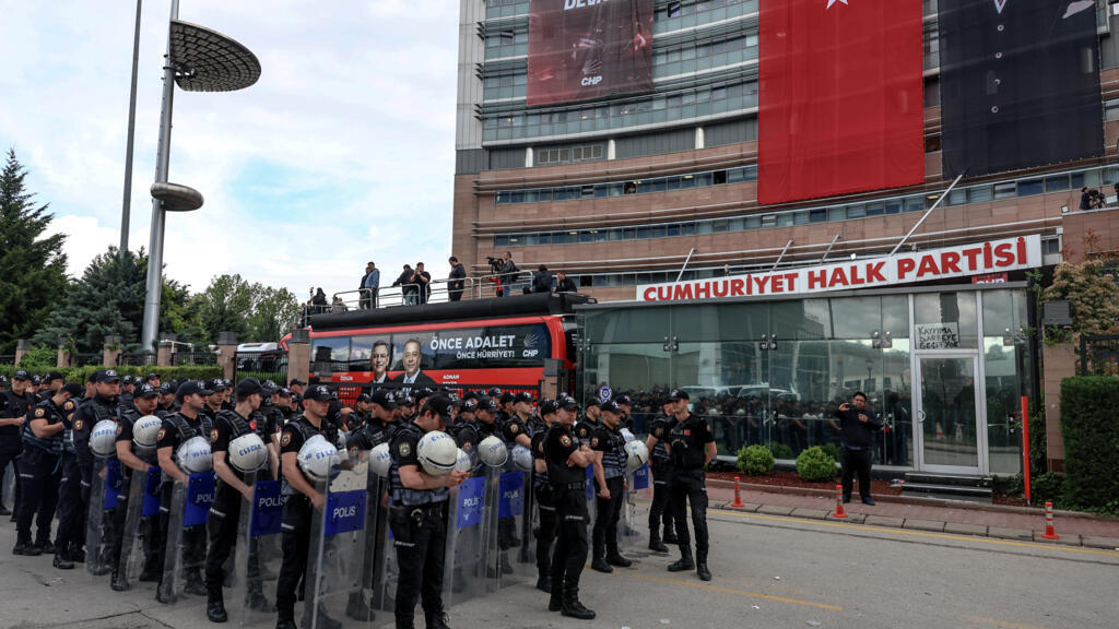 Turkey riot police use tear gas to drive ousted opposition leader from party HQ