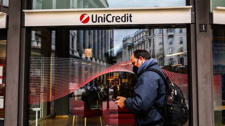 Would-be robber spends night trapped in Milan bank vault – media