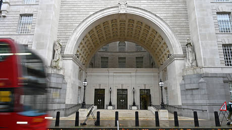 UK spy agency to pay compensation to woman abused by neo-Nazi agent