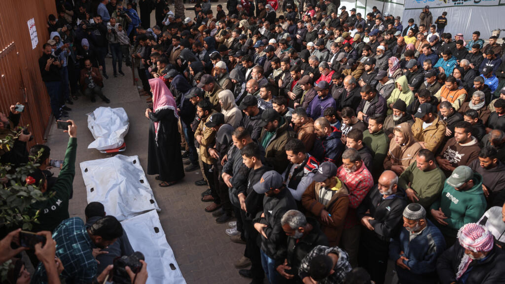 Gaza's civil defence agency says Israeli air strikes kill 12