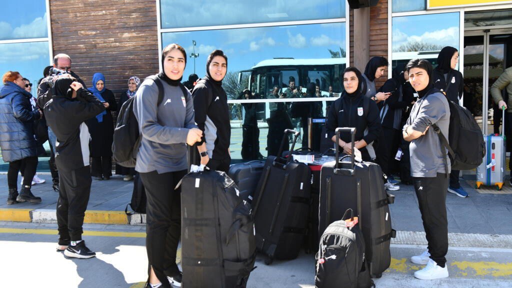 Iranian women's football team return home after asylum tussle