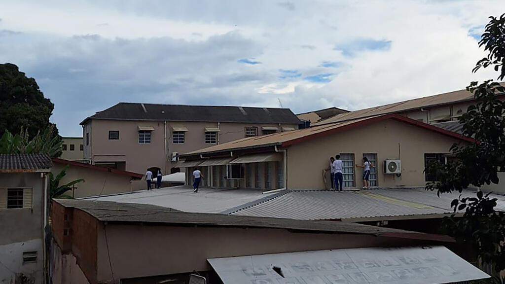 Teen gun attack at Brazilian school kills two staff and injures children