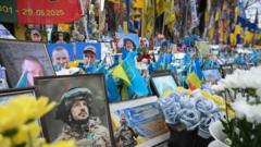 Ukraine remembers its dead as war enters a fifth year