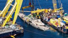 Watch: Sunken British superyacht raised from seabed
