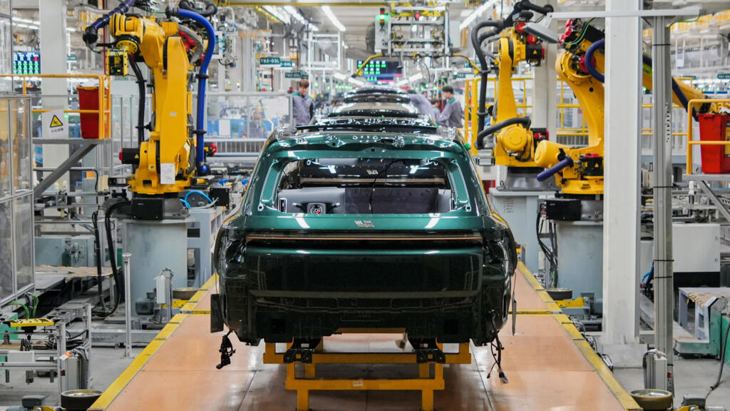 Macron threatens tariffs on Chinese goods but seeks trade deal with EU