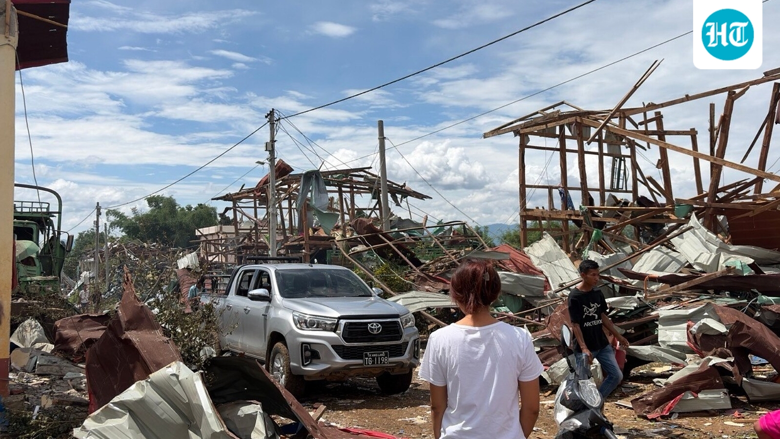Rescuers dig for bodies after a mining explosives blast in Myanmar kills at least 43