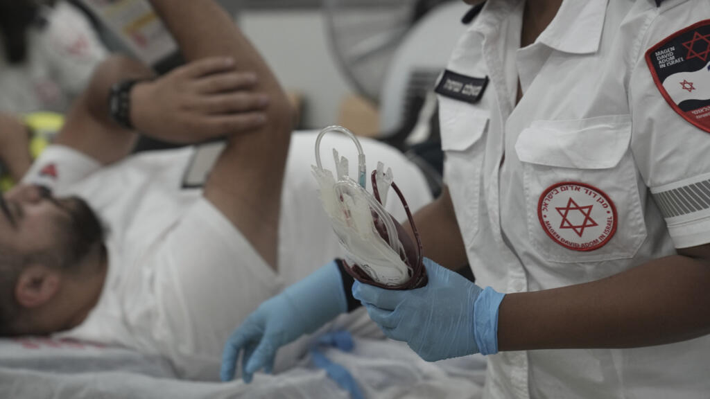 Two killed in northern Israel by Palestinian stabbing, car ramming attack