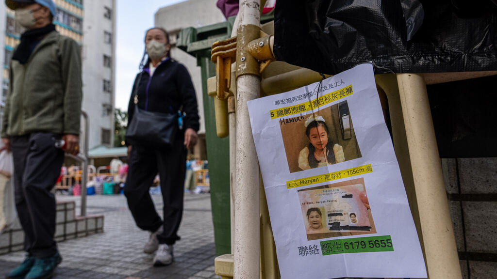 Hong Kong families search for missing after firefighting operations end