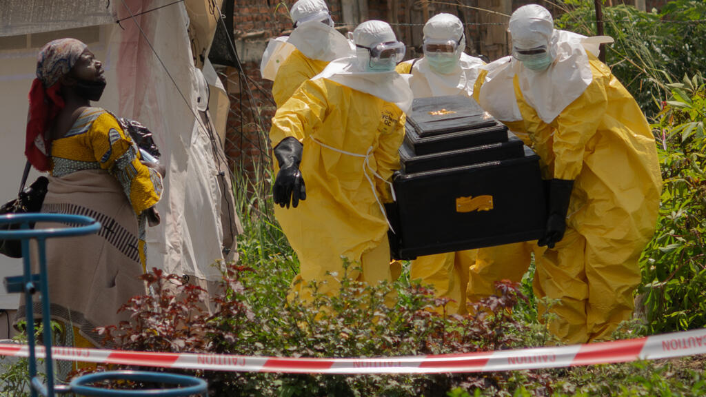 The week in pictures: Ebola outbreak in Africa, Putin in China and Cannes Film Festival mermaids