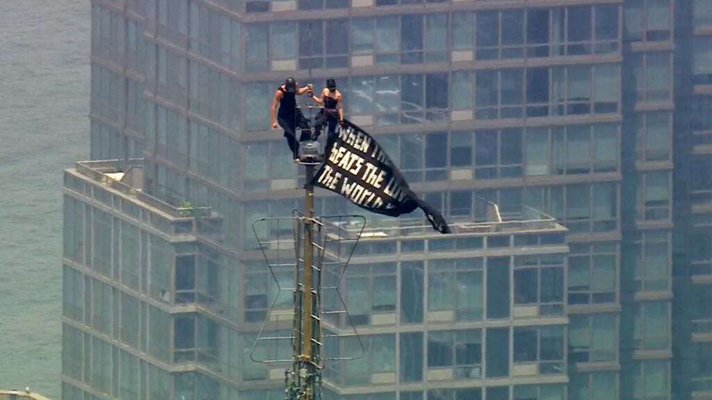 Two arrested after scaling Empire State Building antenna for marriage proposal