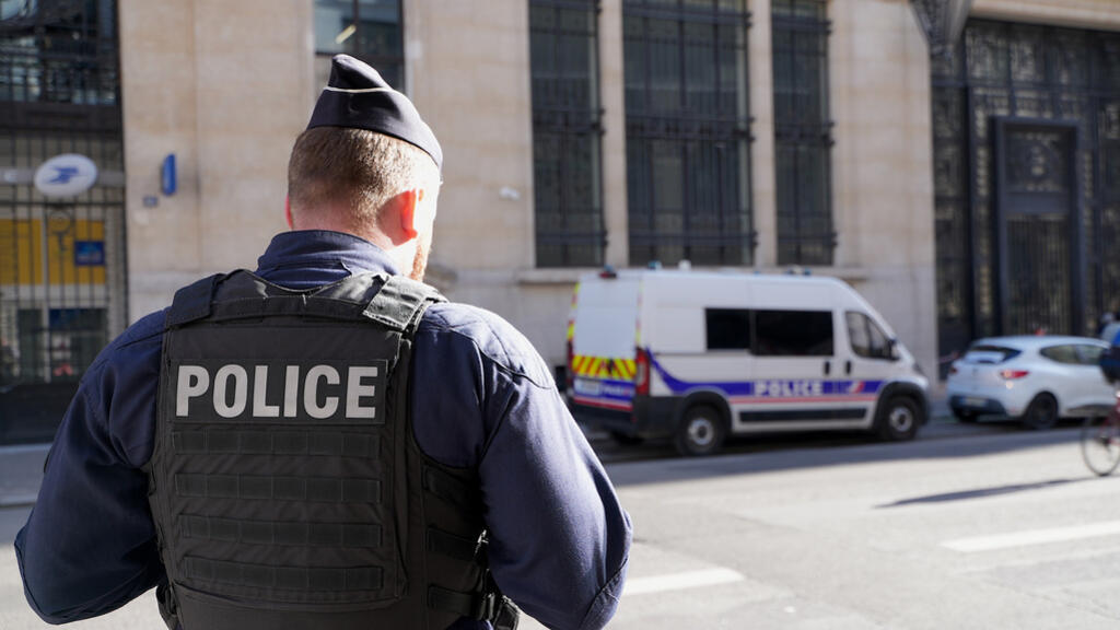 France ramps up Paris security after foiled attack on US bank