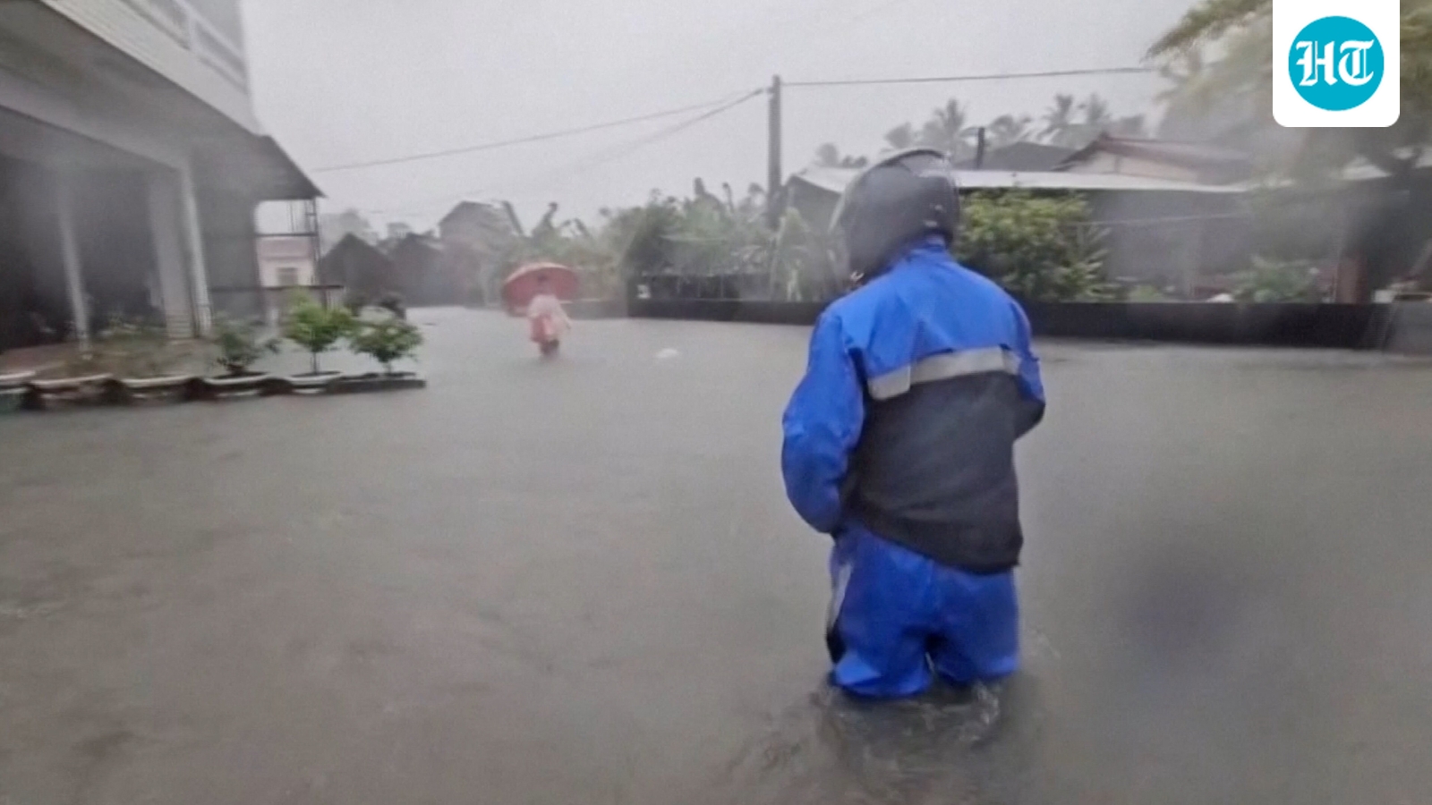Torrential rains shut down Taiwan as Japan issues flood warnings amid storm