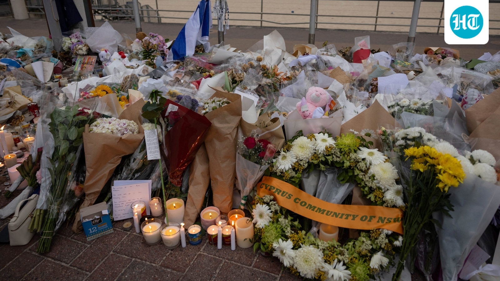 Australia observes silence, lights candles for Bondi Beach shooting victims