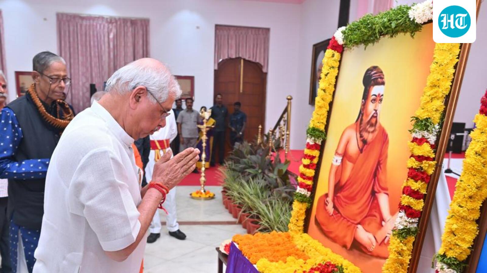 TVK, DMK criticise Guv paying tribute to Thiruvalluvar’s photo in saffron attire