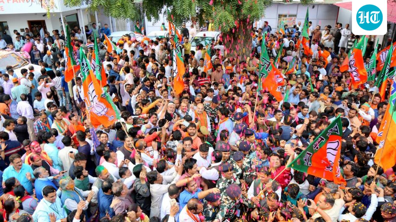 BJP celebrates with jhalmuri, saffron holi