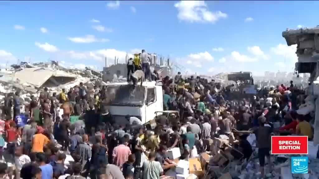 Aid trucks trickle into Gaza