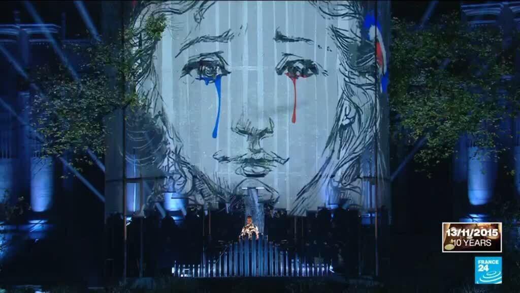 The 'Tree of Justice' lights up at commemoration of the 2015 Paris terror attacks