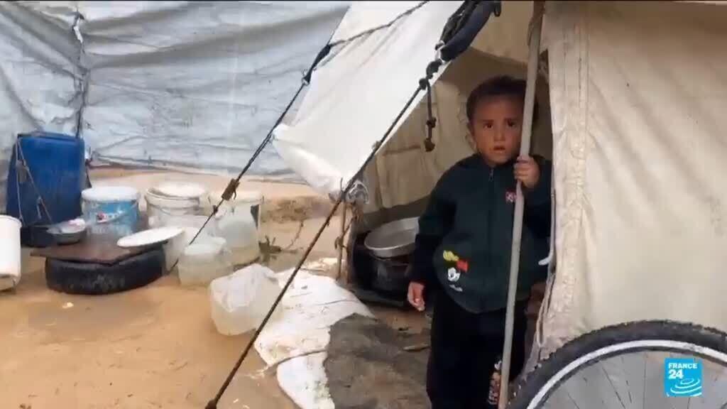 'Shivering from cold and fear': Winter rains flood Gaza camps