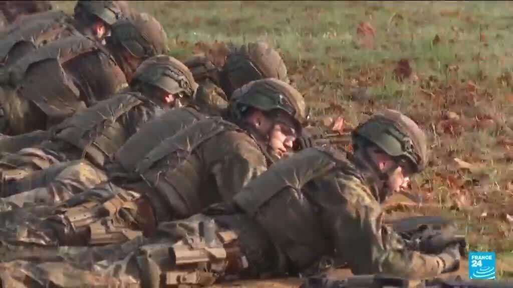 Germany works to clarify new rules on fighting-age men leaving country