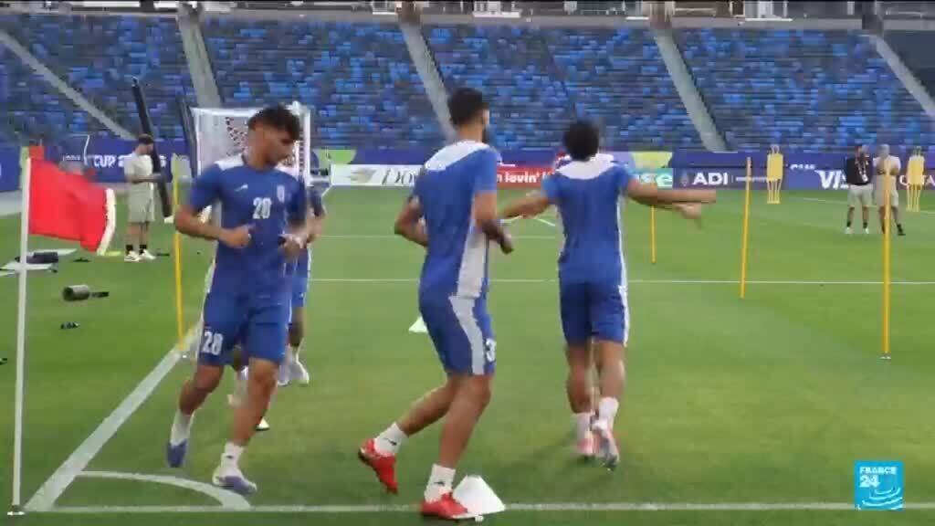 Iran take World Cup centre stage as they arrive in US