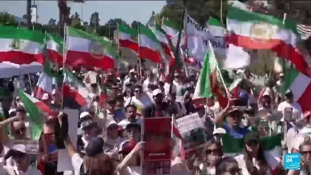 Flag debate divides diaspora as Iran begin World Cup with New Zealand draw