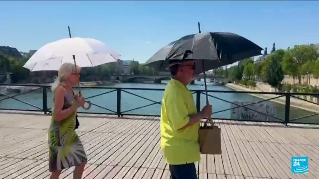 'Brutal': Paris tourists struggle in extreme heat as sites close early