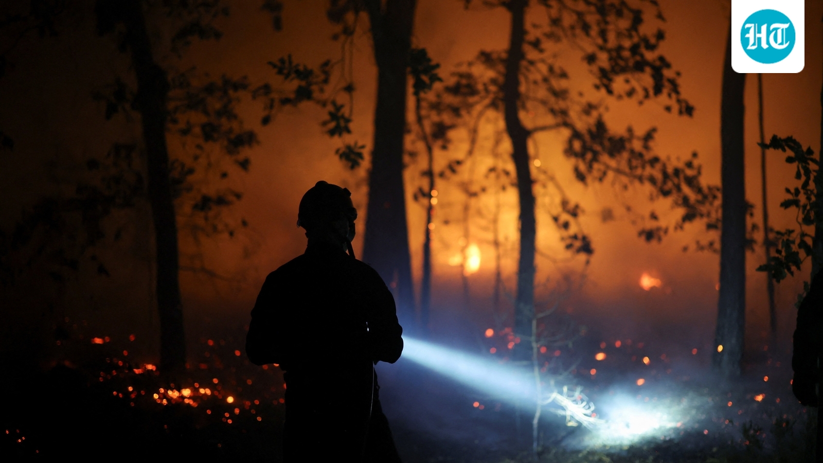 Smoke, heat and 100+ burning wildfires force thousands to flee US wilderness; evacuations underway