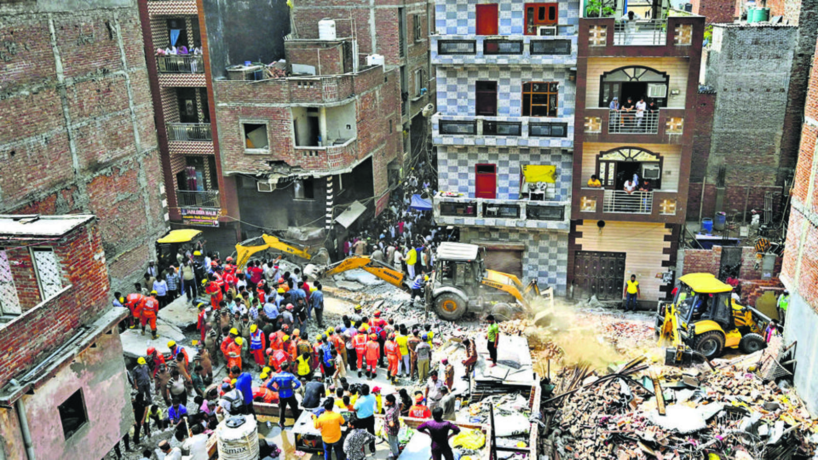 11 killed as four-storey building in northeast Delhi's Mustafabad caves in