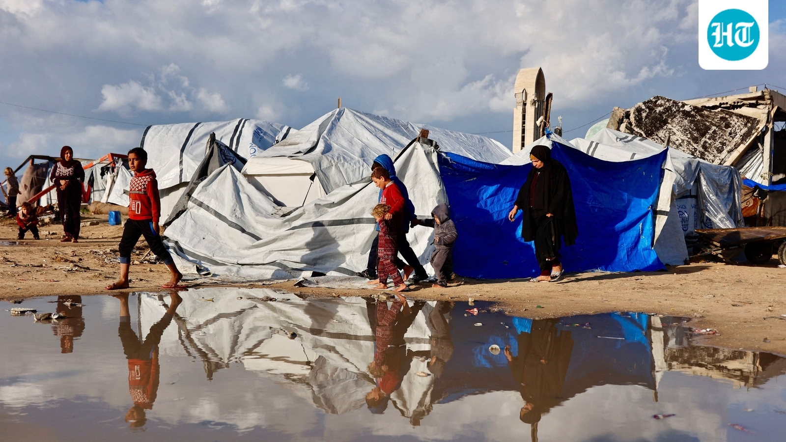 Winter rain causes chaos in Gaza camps as Netanyahu proceeds for US meeting