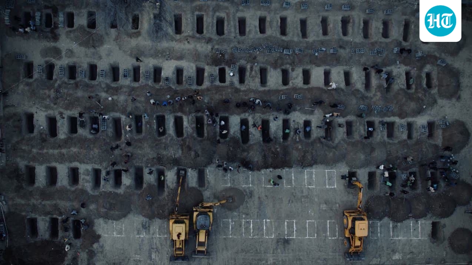 A haunting image of ‘small graves for little angels’ killed in US-Iran war