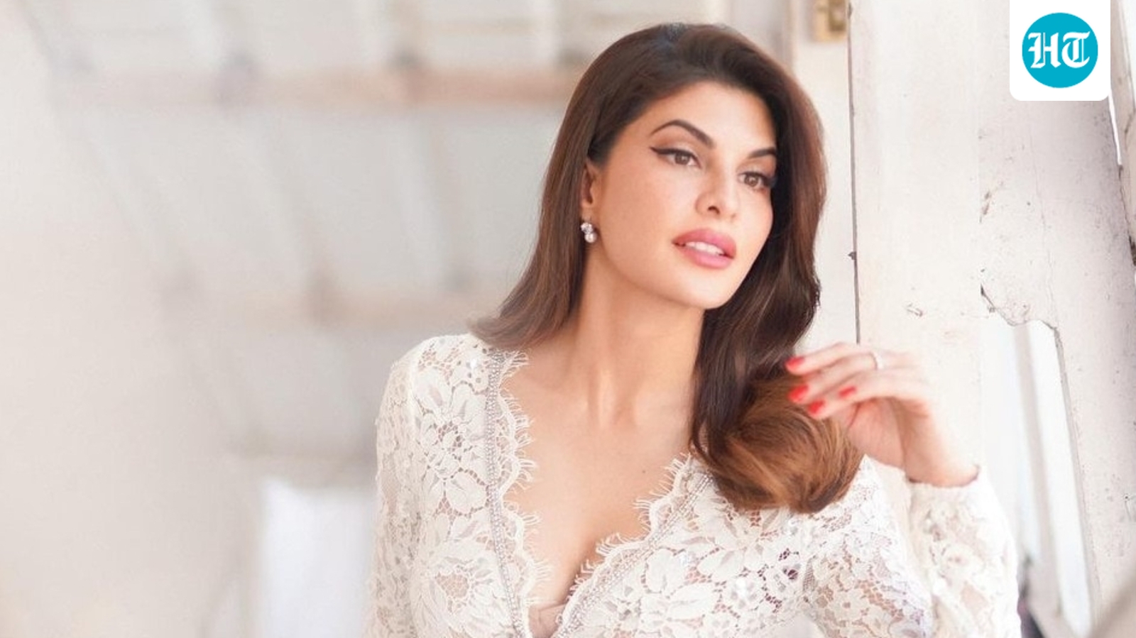 Jacqueline Fernandez reacts to secretly filmed video of her sitting at a restaurant, talking to a man