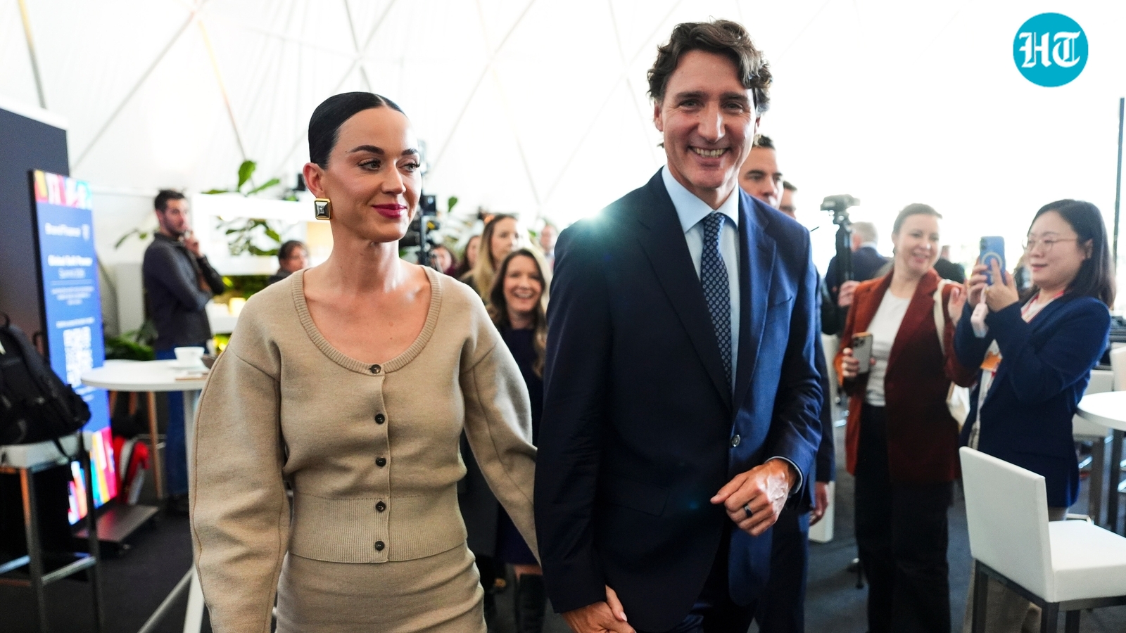 Katy Perry winks at Justin Trudeau, flirts from a distance as he takes the stage at WEF summit. Watch